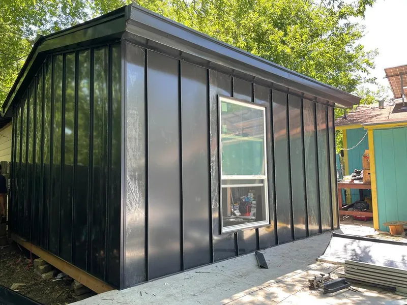 Black standing seam metal wall panels for Metal Roof Installation in St. Paul