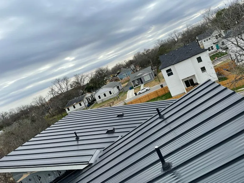 Standing seam metal roof panels with vents for Skylight Repair in St. Paul